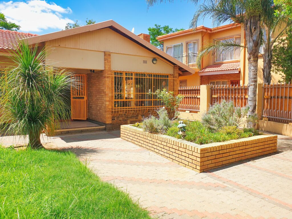 Beautiful suburban home in Pretoria, featuring lush greenery and modern architecture.